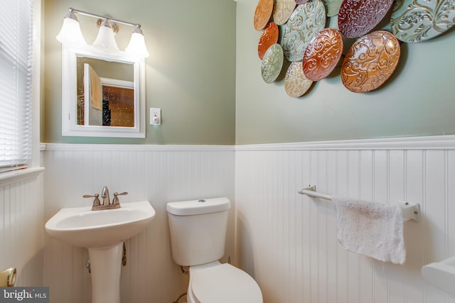 bathroom with sink and toilet