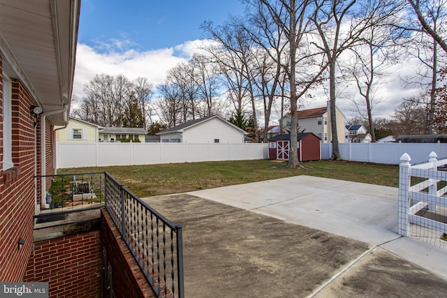 view of patio with a storage shed