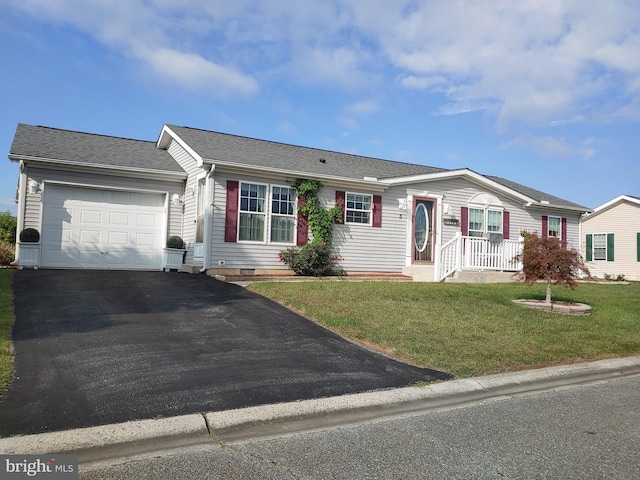 single story home with a garage and a front yard