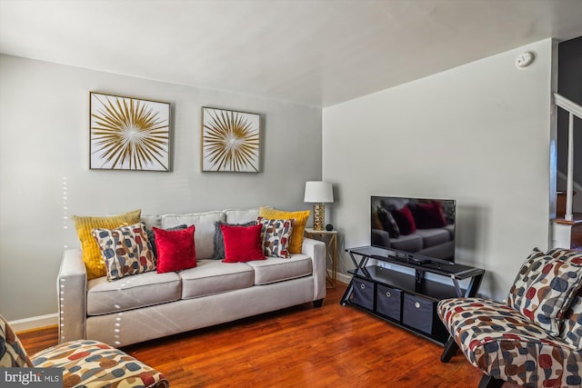 living room with dark hardwood / wood-style floors