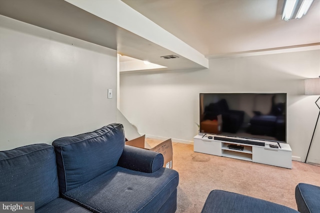 living room featuring light carpet