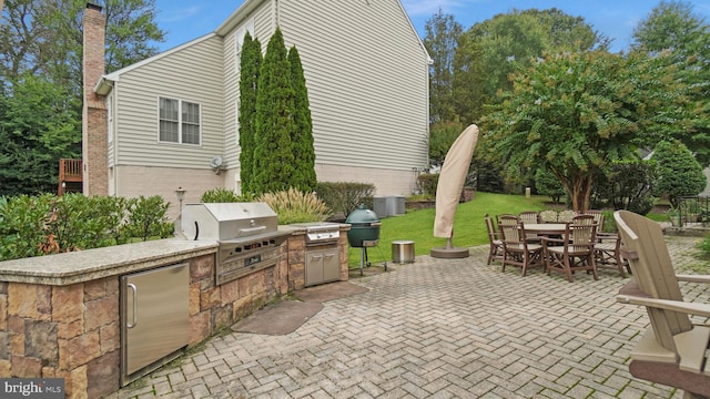 view of patio / terrace with grilling area and exterior kitchen