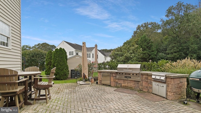 view of patio / terrace with exterior kitchen and grilling area