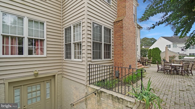 view of home's exterior with a patio