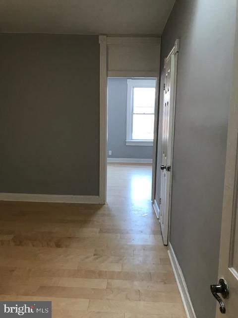 hall featuring light hardwood / wood-style floors