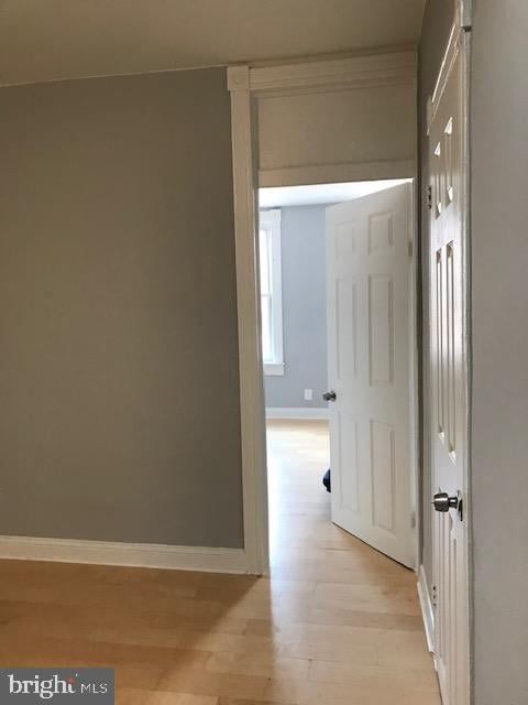 hallway featuring light wood-type flooring