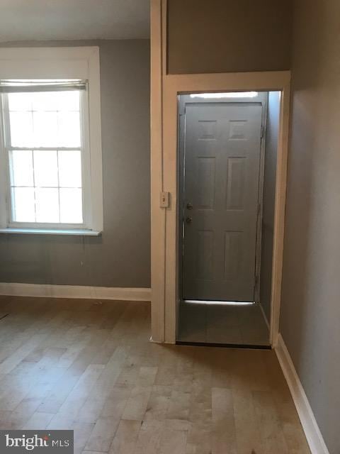 entrance foyer with light hardwood / wood-style flooring