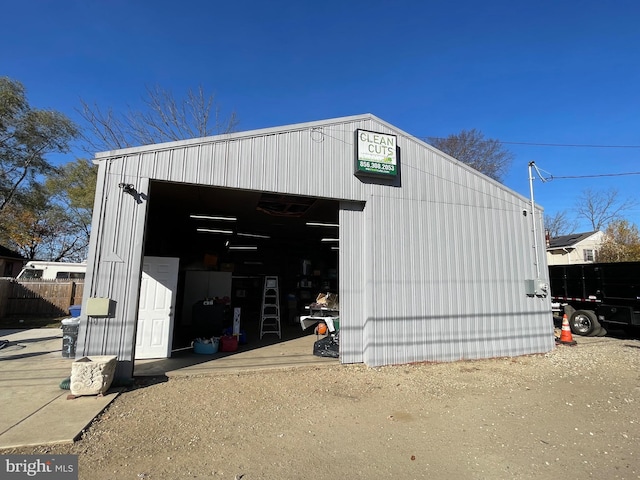 view of outbuilding with a garage