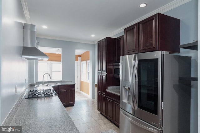 kitchen featuring light tile patterned floors, sink, wall chimney exhaust hood, appliances with stainless steel finishes, and crown molding