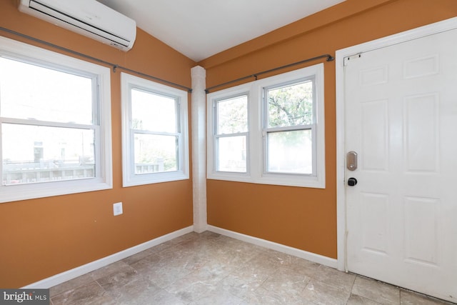 entryway with a wall mounted AC