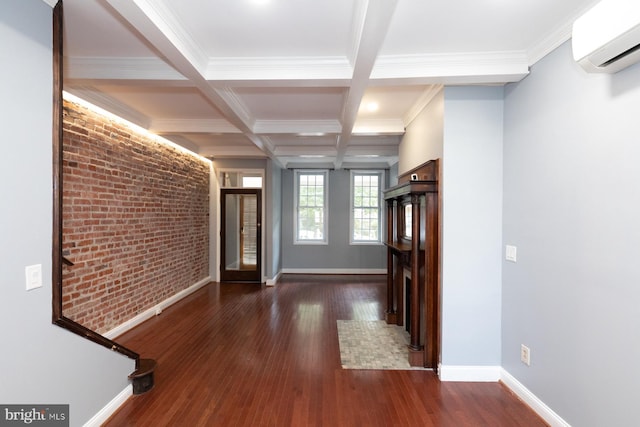 foyer with dark wood-type flooring, crown molding, coffered ceiling, beam ceiling, and a wall mounted AC