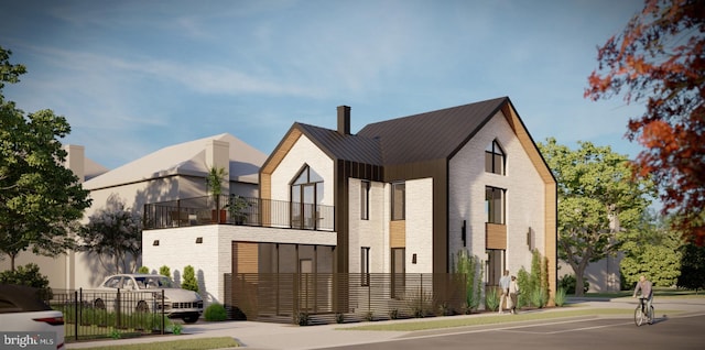 view of front of home featuring a balcony