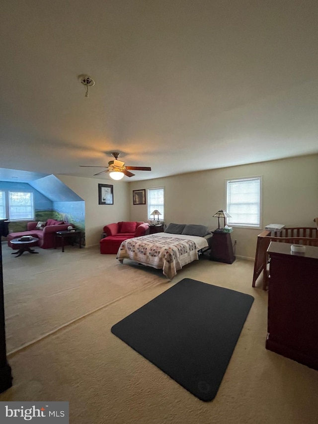 carpeted bedroom with ceiling fan