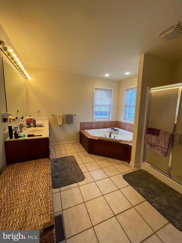 bathroom with vanity, tile patterned floors, and separate shower and tub