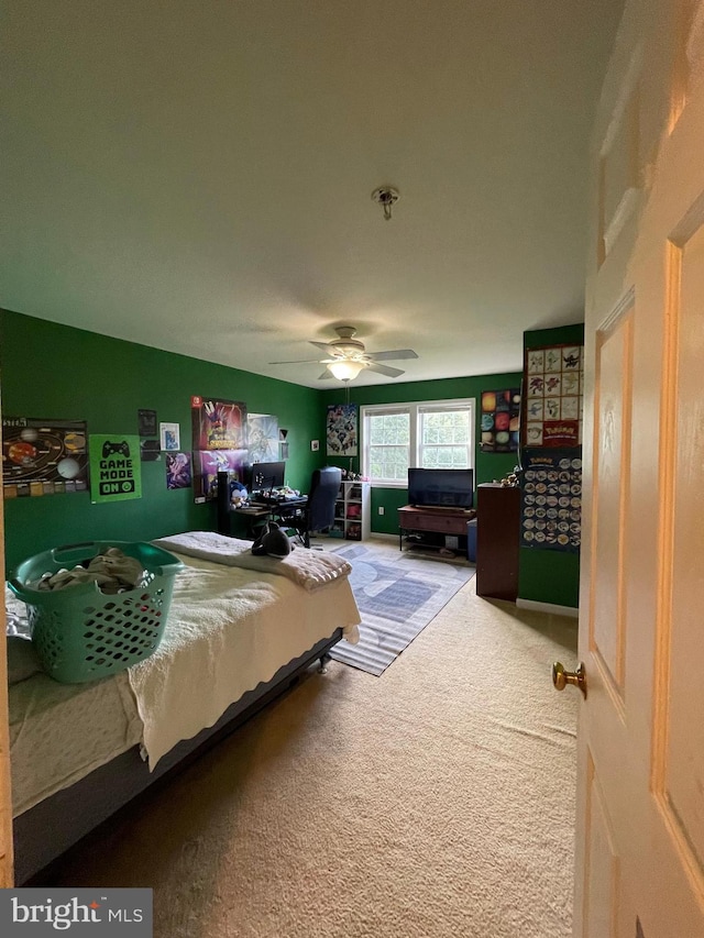 carpeted bedroom with ceiling fan