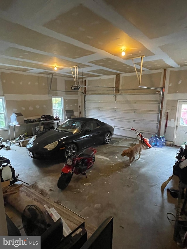 garage featuring a garage door opener