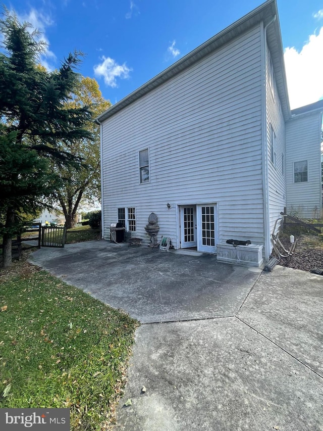 back of property with a patio area