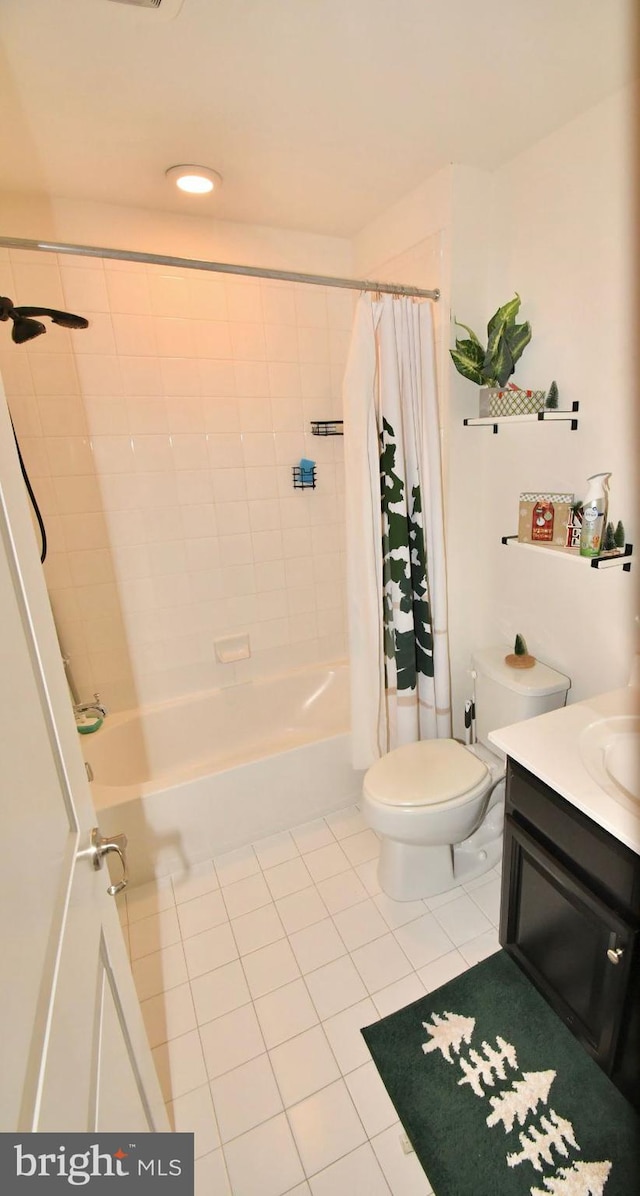 full bathroom with vanity, toilet, shower / bath combination with curtain, and tile patterned flooring