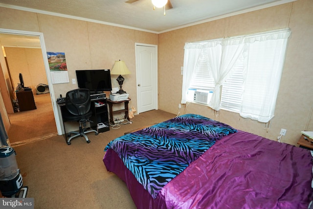 bedroom with a textured ceiling, cooling unit, carpet, ornamental molding, and ceiling fan