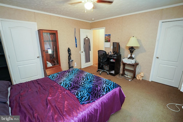 carpeted bedroom featuring a textured ceiling, crown molding, and ceiling fan