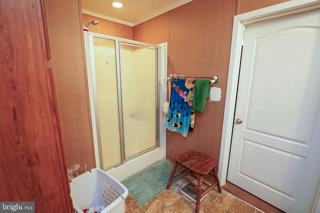 bathroom featuring a textured ceiling, shower with separate bathtub, and tile patterned flooring