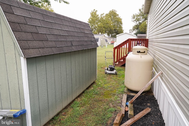 exterior space featuring a storage unit