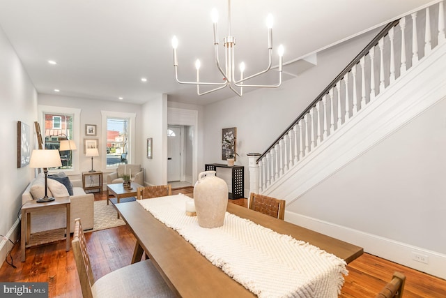 dining space with dark hardwood / wood-style floors