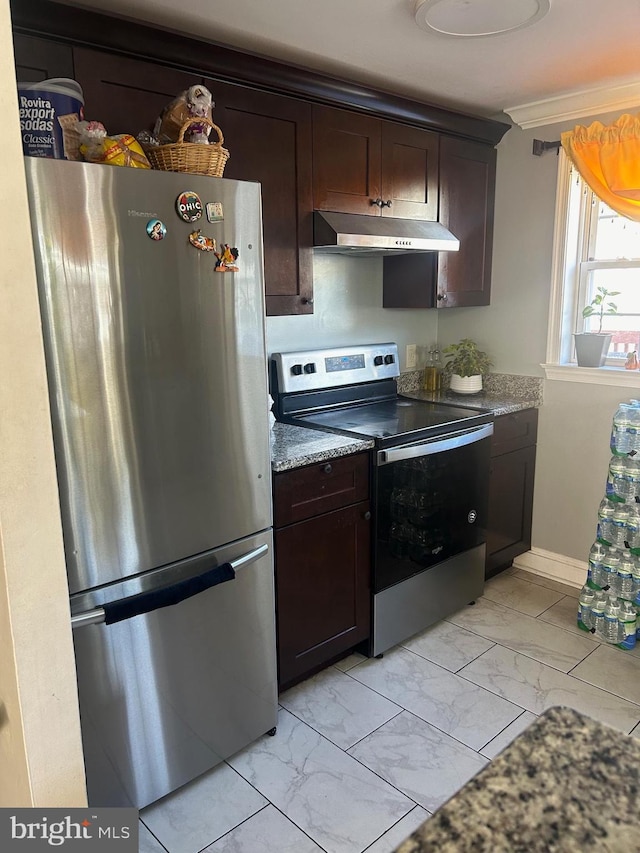 kitchen with light stone countertops, appliances with stainless steel finishes, and dark brown cabinetry