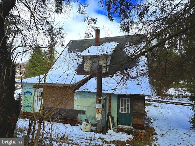 view of snow covered property