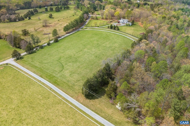 birds eye view of property featuring a rural view