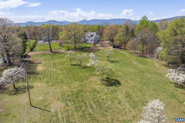 aerial view with a mountain view and a rural view