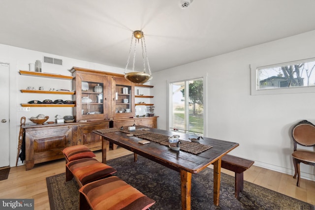 dining room featuring light wood-type flooring