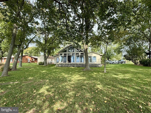 exterior space with a front lawn