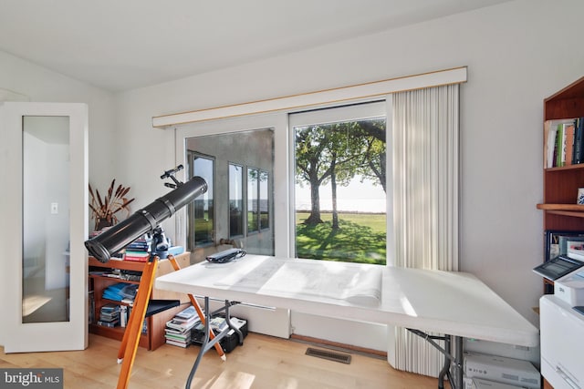 miscellaneous room featuring hardwood / wood-style flooring