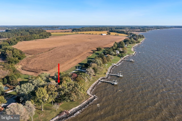 bird's eye view featuring a water view and a rural view