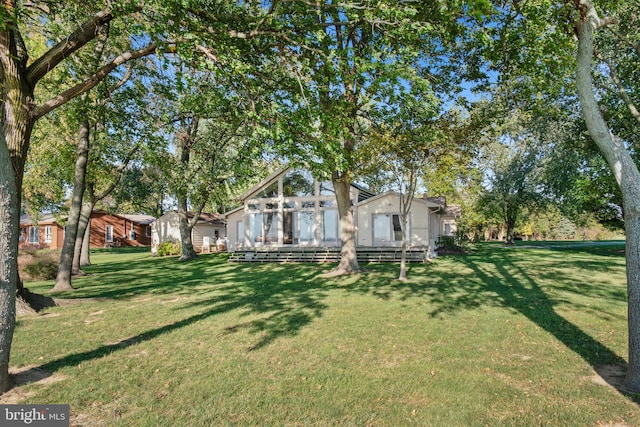 exterior space with a front lawn