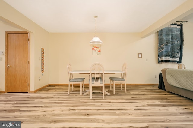 dining room with light wood-type flooring