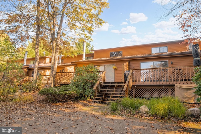 rear view of house with a deck