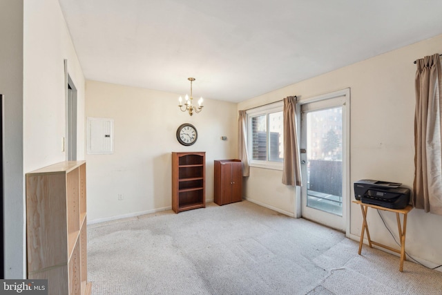 interior space featuring electric panel, light colored carpet, and a chandelier