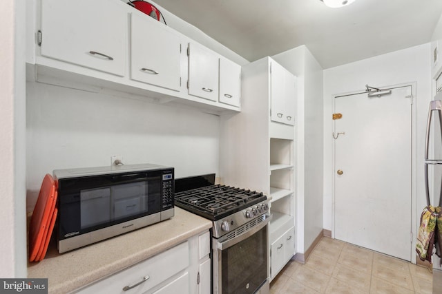 kitchen with white cabinetry and stainless steel appliances