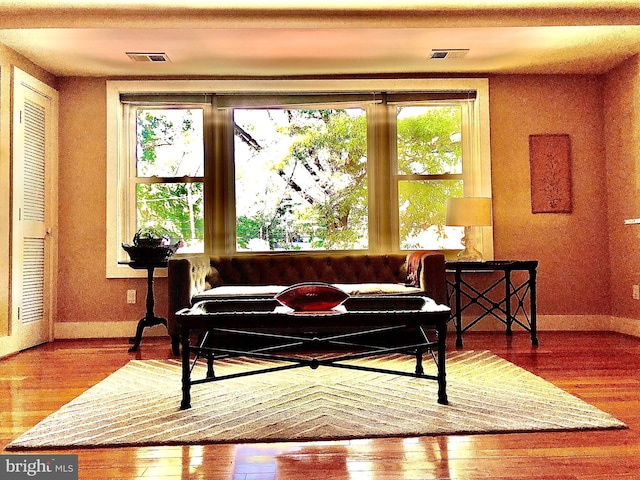 living area featuring hardwood / wood-style flooring