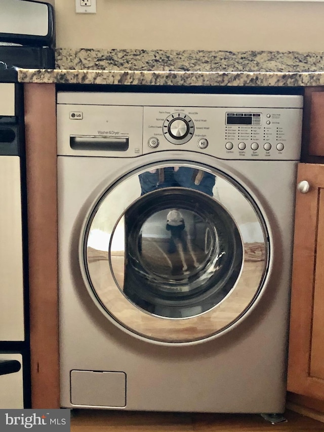 4840 Macarthur Blvd NW Unit 501, Washington, DC 20007 - washroom featuring washer / clothes dryer and laundry area