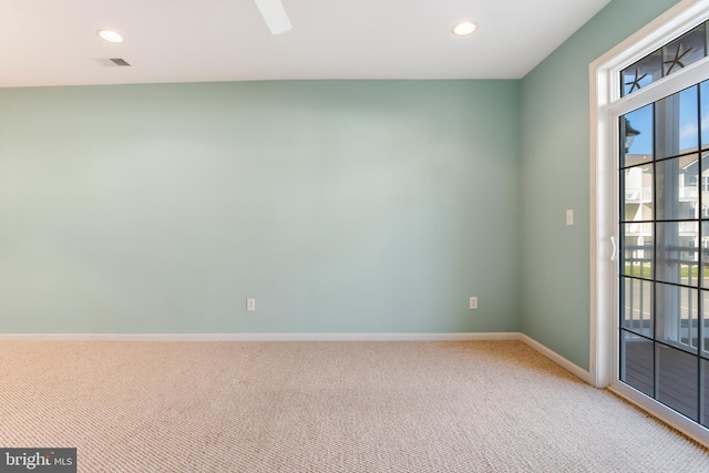 view of carpeted spare room