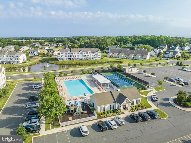 birds eye view of property featuring a water view