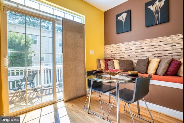 dining space featuring hardwood / wood-style flooring