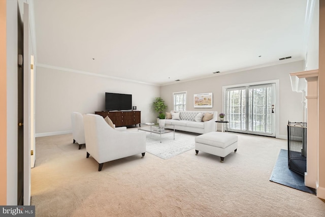 carpeted living room with crown molding