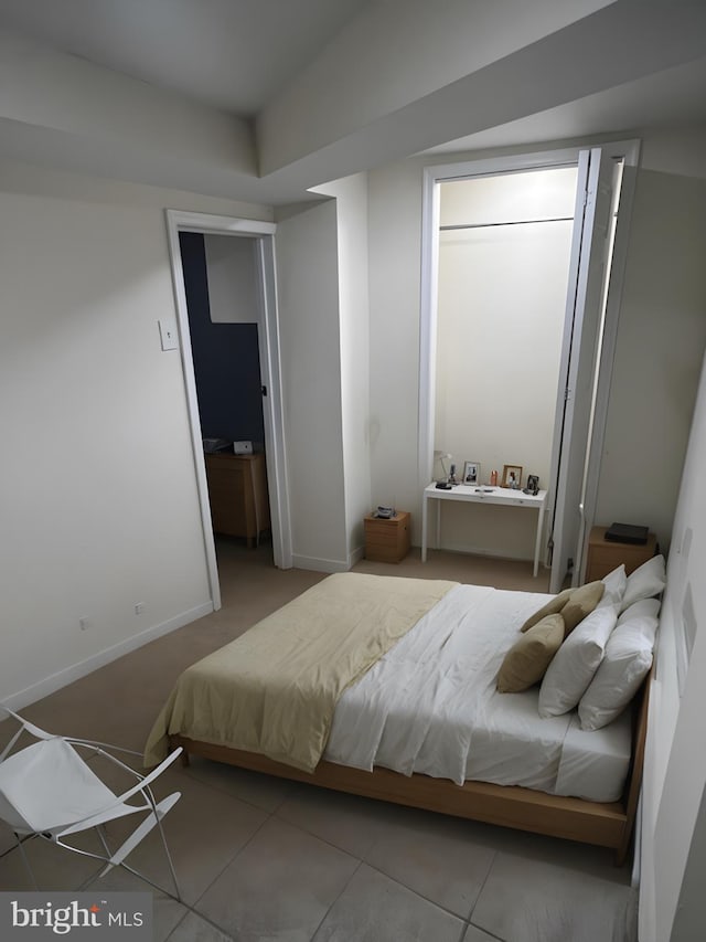 bedroom featuring tile patterned floors