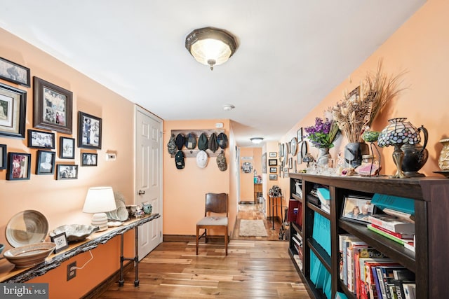 sitting room with light hardwood / wood-style flooring