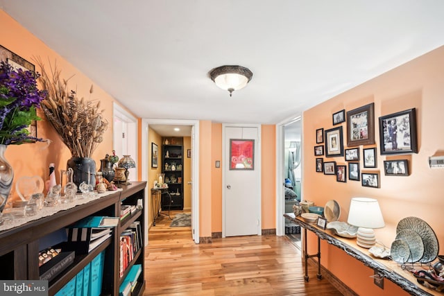 office area with light hardwood / wood-style floors