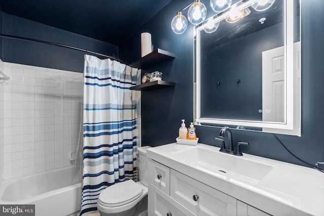 full bathroom with vanity, shower / bath combo, and toilet